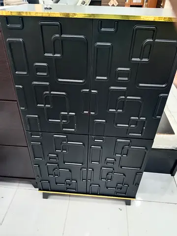 Modern Black Geometric Storage Cabinet with Gold Trim