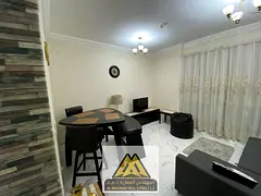 Furnished one-bedroom apartment with a living room and open city view; includes a gym, swimming pool