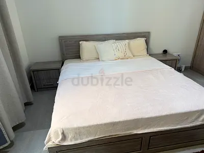 Queen bed with side tables