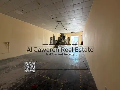 A well-located warehouse is available for rent in Ajman Industrial Area 1, situated on a main road