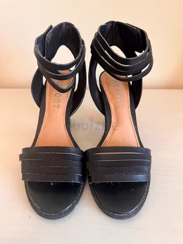 Report black ankle-strap sandals