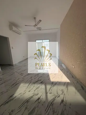 Spacious 2BR + living room in Al Rawda 3, open view, 3 baths, near Al Salam St, family only, split