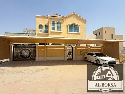 Villa for rent in Al Yasmeen, Ajman – 5 master bedrooms, a majlis, and a large family living area.