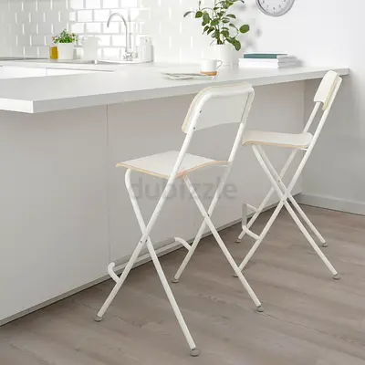 Set of 2 white folding bar stools — lightweight, space-saving