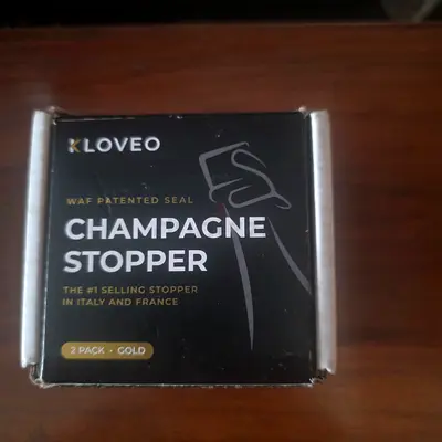 Set of 2 Champagne Bottle Stoppers (Gold) - New in Box. Made in Italy.