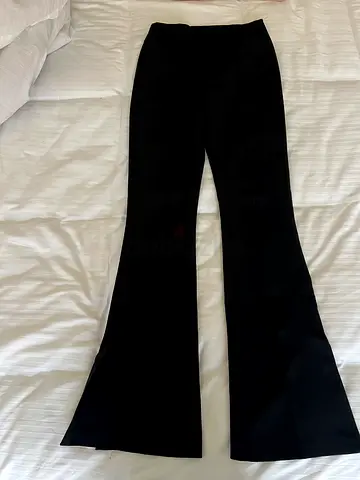 Black flared women's trousers , good condition