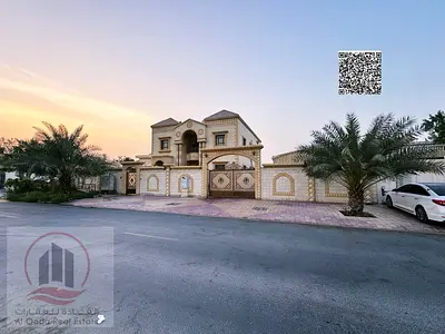 Villa for sale in Ajman, Al Rawda area, 9000 sq ft, 7 master bedrooms with roof terrace, majlis, living room, maid's room. Freehold ownership for all
