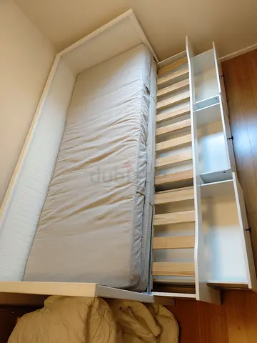 White day bed with built-in drawers and mattress