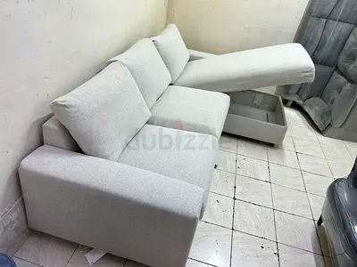 L-shaped fabric sofa with storage  good condition