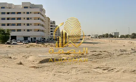 أرض تجارية زاوية للبيع بموقع مميز في مويلح التجارية (الفلاح)، الشارقة.