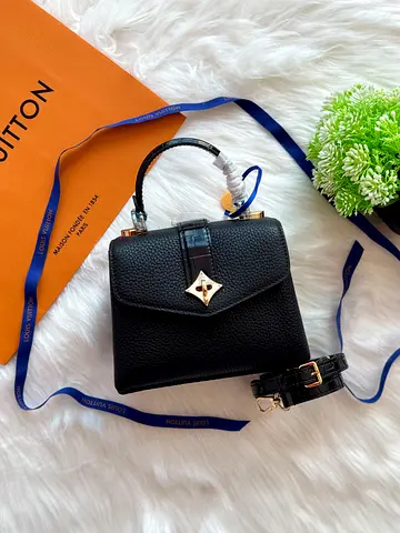 Black leather top-handle bag with detachable strap (like Louis Vuitton Capucines style)
