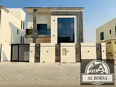 For sale in Al Amrah area, Ajman: a villa with 6 master bedrooms, a majlis, a living room, and a mai