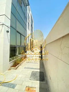 A luxury-finished villa for sale in Al-Hawshi, Al-Badiya neighborhood, Sharjah Emirate.