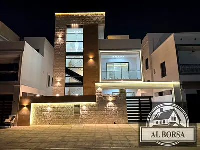 Villa for sale in Al Bahia, Ajman. 6 master bedrooms, large majlis, large living room and kitchen.