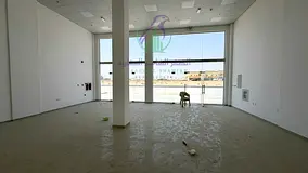 1,000 Sq. Ft. brand-new shop in Al Sajaa, main road, glass frontage, first use, fully fitted, prime 