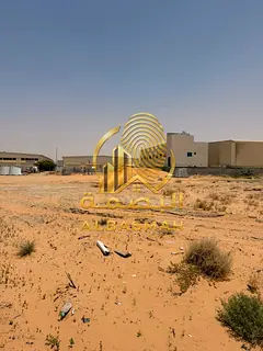 Industrial land for sale in Al Sajaa S, steps to the main road.