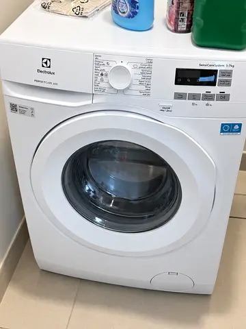 Electrolux front-load washing machine - 7kg, came brand new with my villa