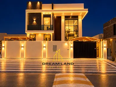 4-Bedroom Villa for Sale in Al Helio, Ajman Villa for Sale in Al Helio The kitchen is equipped with essential appliances and connects directly to th