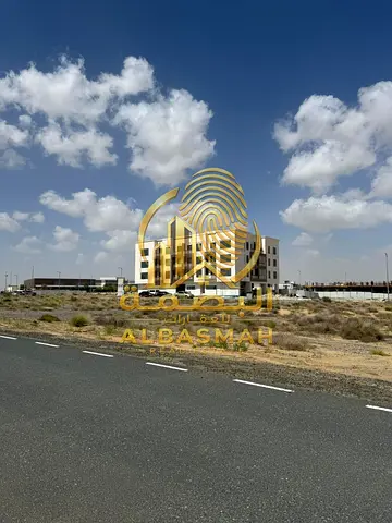Commercial Land for Sale in Tilal Al Suyoh Sharjah with G+Parking+5 Floors and Freehold Ownership