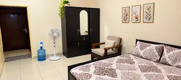 Fully furnished family room for Rent in Abu shagara