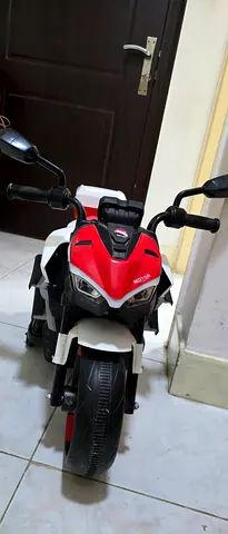 Kids Electric Ride-On Motorcycle - Red/White, Good Condition