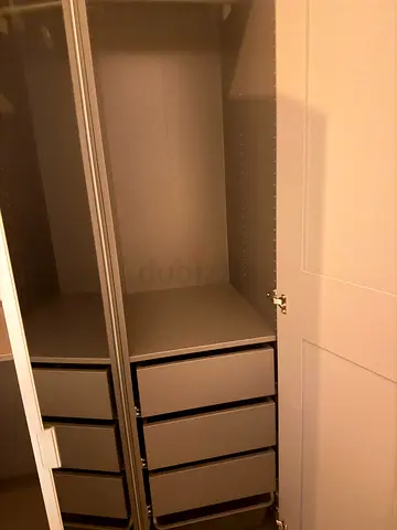IKEA PAX wardrobe with mirrored sliding door and internal drawers - gray