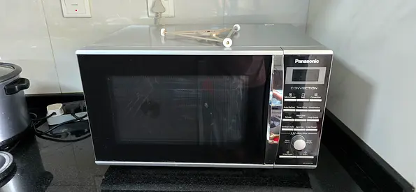 Panasonic 27L Convection Microwave Oven (NN-CD674M) – Used