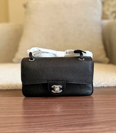 Classic black Chanel double flap mini bag (Caviar leather)