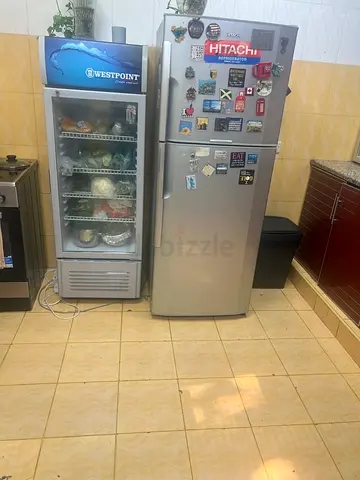 Two Fridges: Silver Double-Door Refrigerator and Display Cooler - Good Working Condition