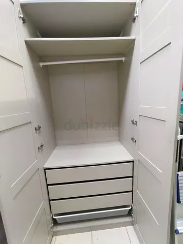 White 2-door wardrobe with drawers and hanging rail