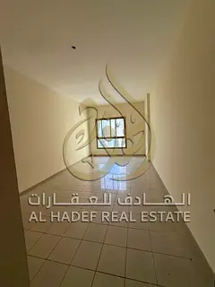 1 Bedroom + Living Room for Annual Rent in Al Qasba with Spacious Layout, American-Style Kitchen, St