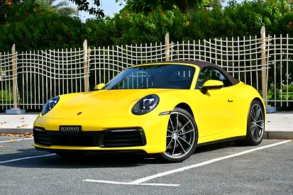 2024 Porsche 911 Carrera Cabriolet | Racing Yellow / Brown Roof | 379 HP | 989 KM | Porsche Warranty