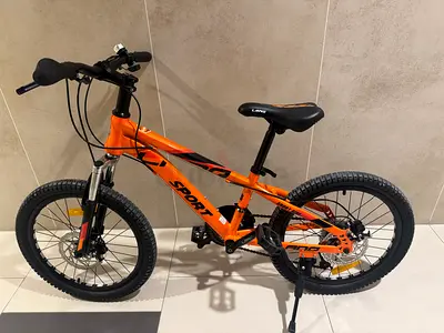 20” Kids Mountain Bike – 21 Speed Shimano-style gearing, front suspension, very good condition.