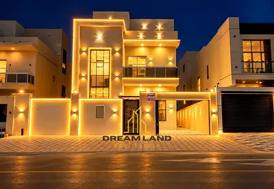 4-Bedroom Villa for Sale in Al Helio, Ajman Villa for Sale in Al Helio The kitchen is equipped with essential appliances and connects directly to th