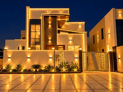 4-Bedroom Villa for Sale in Al Helio, Ajman Villa for Sale in Al Helio The kitchen is equipped with essential appliances and connects directly to th