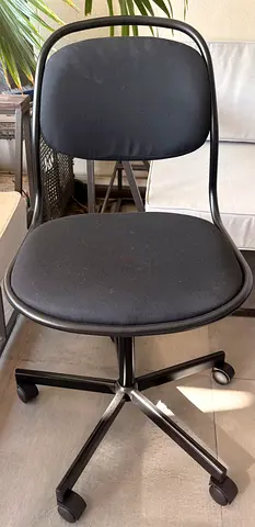Simple black swivel office chair with casters - good condition