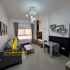 Luxury apartment, first occupancy, one bedroom and living room with an open balcony. Ajman Corniche.
