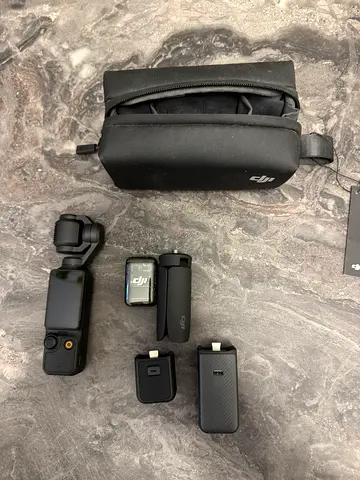 DJI Osmo Pocket with Accessories and Carry Pouch - Good Condition