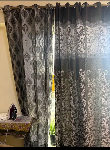 Pair of Grey Patterned Eyelet Curtains - Light-Filtering. 6 curtains