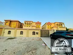 Villa for rent in Ajman Al Muwaihat 2 on the corner of two streets, beautiful location, payment faci