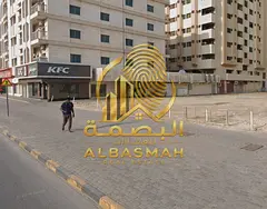 Commercial land for sale in Sharjah, specifically in Al Majaz 2, 20 feet area directly on Al Wahda S