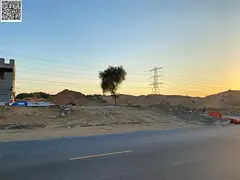 Residential land for sale in a prime location in the Al-Yasmeen area.