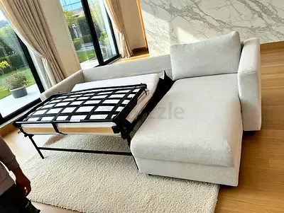 Light Beige L-Shaped Sofa bed with Pull-Out Bed - Good Condition