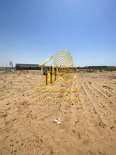 Industrial land for sale in Arqoub Industrial Area, Sharjah, with an area of 10,000 square feet. Own