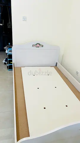 Single white wooden bed frame with floral headboard | Queen wooden bed