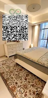 For sale in Gulfa Tower: a one-bedroom apartment with a living room, featuring a swimming pool, gym