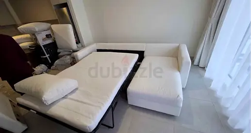 L-shaped Sofa Bed with Chaise - Good Condition vimle