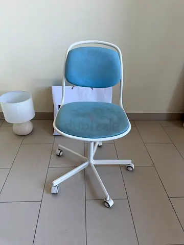 White metal office chair with blue cushion, on wheels - good condition