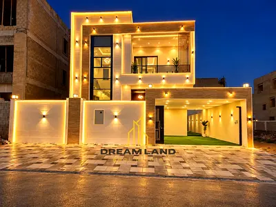 4-Bedroom Villa for Sale in Al Helio, Ajman Villa for Sale in Al Helio The kitchen is equipped with essential appliances and connects directly to th