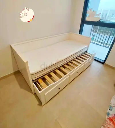 IKEA Hamnes Day bed with 3 storage drawers underneath and with 2 IKEA mattresses is available